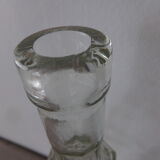 Chiseled glass bottle