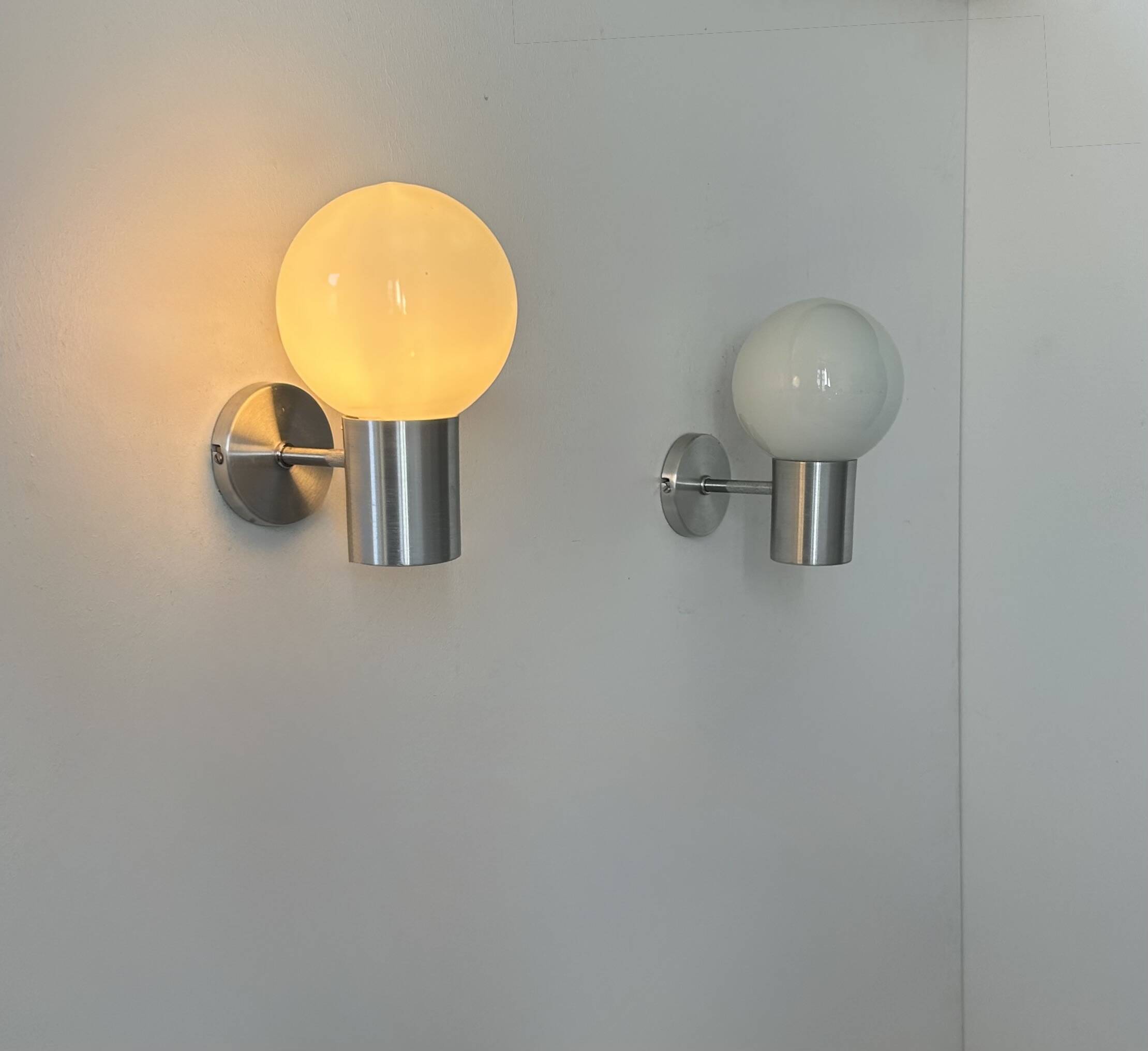 Pair of vintage wall lights, aluminum and opaline, France, 1980