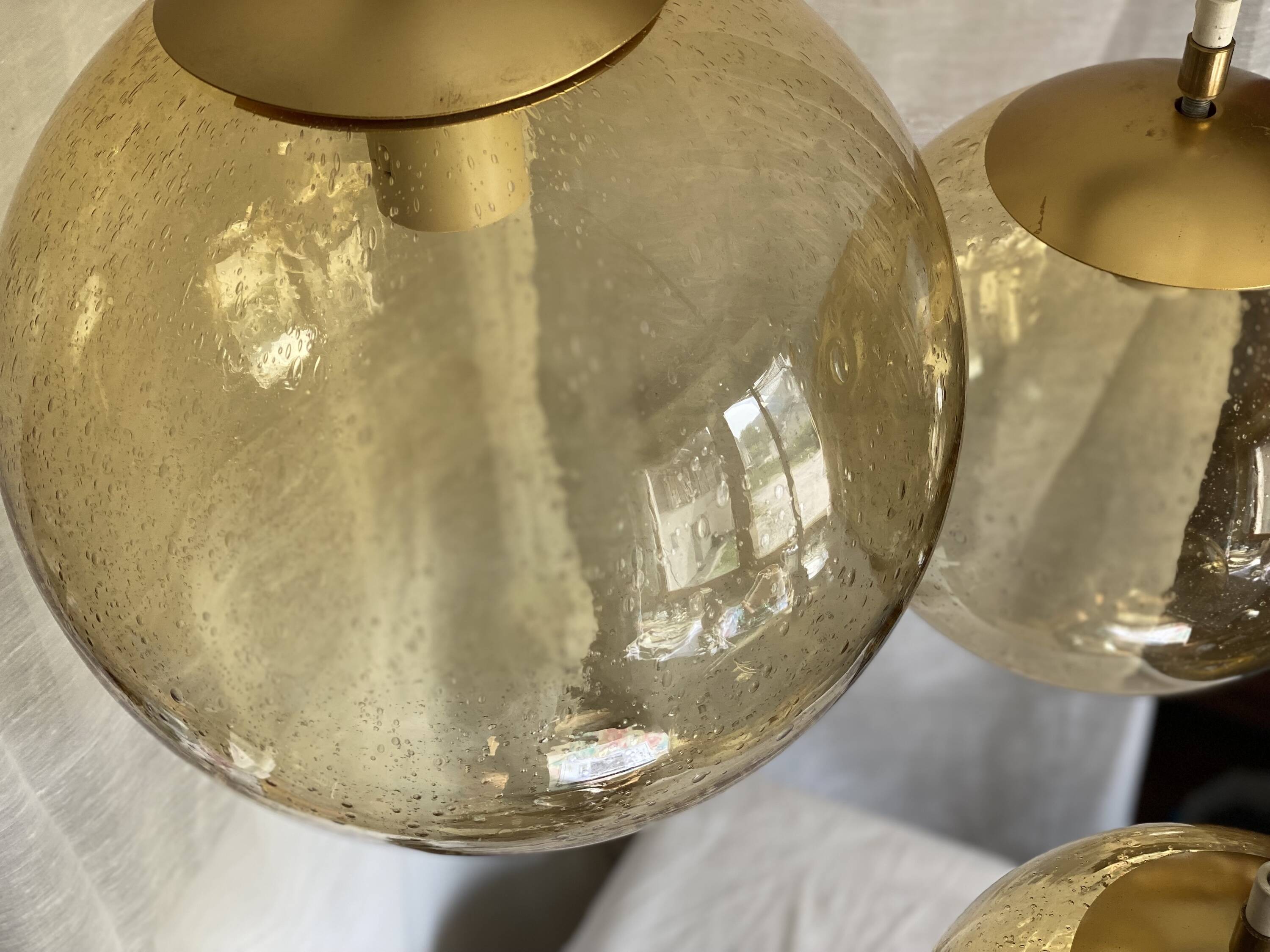 Suspension cascade with 3 globes of vintage golden yellow bubbles from the 1970s.