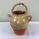 Glazed terracotta jug