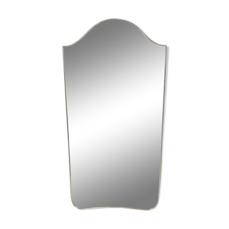 “Gendarme hat” mirror in gilded brass. 1960s.