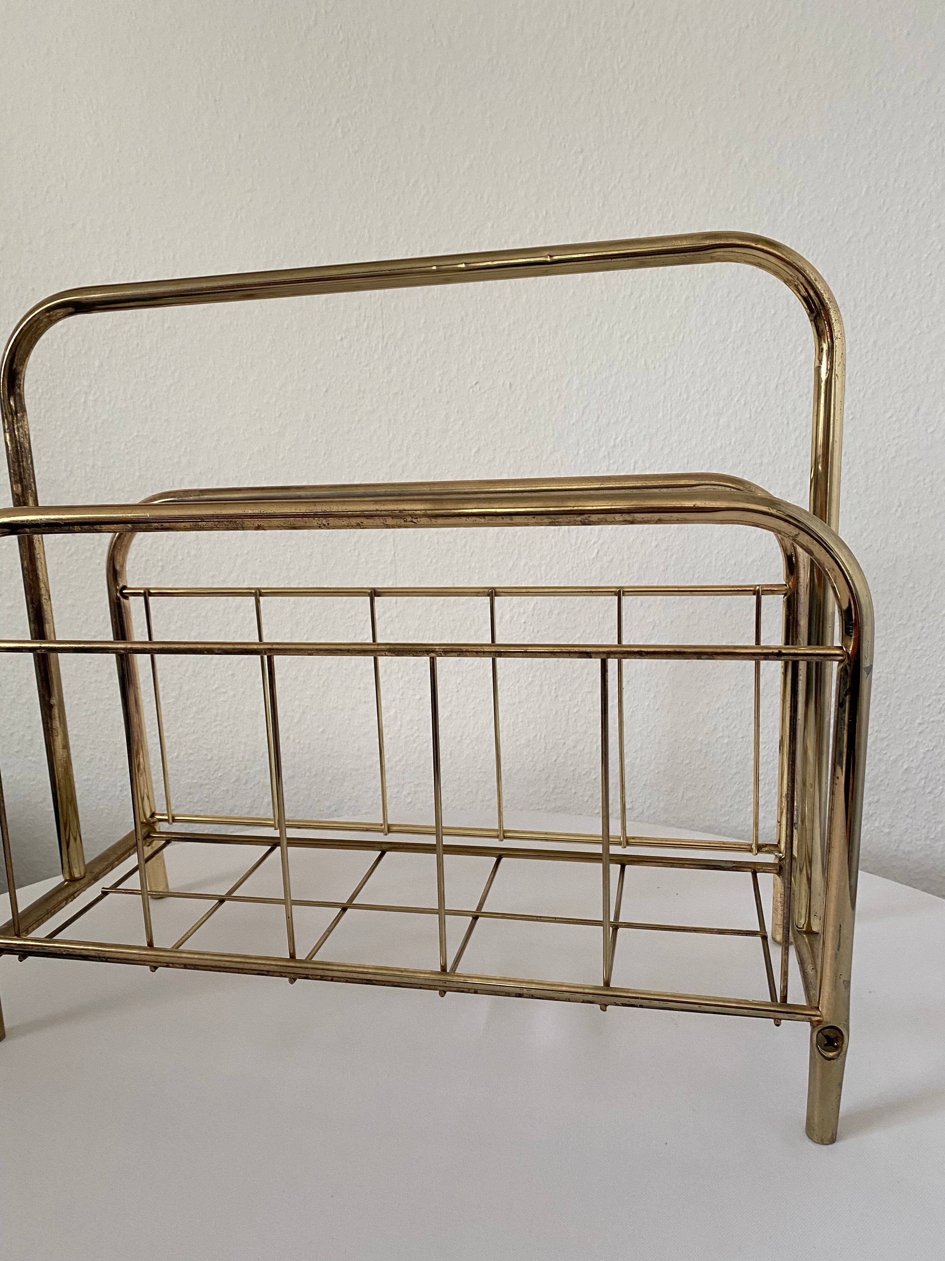 Gilded metal magazine door