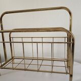 Gilded metal magazine door