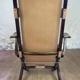 Colonial style leather armchair and ottoman