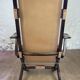 Colonial style leather armchair and ottoman