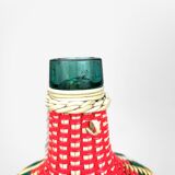 Multicolored glass bottle and braided scoubidou