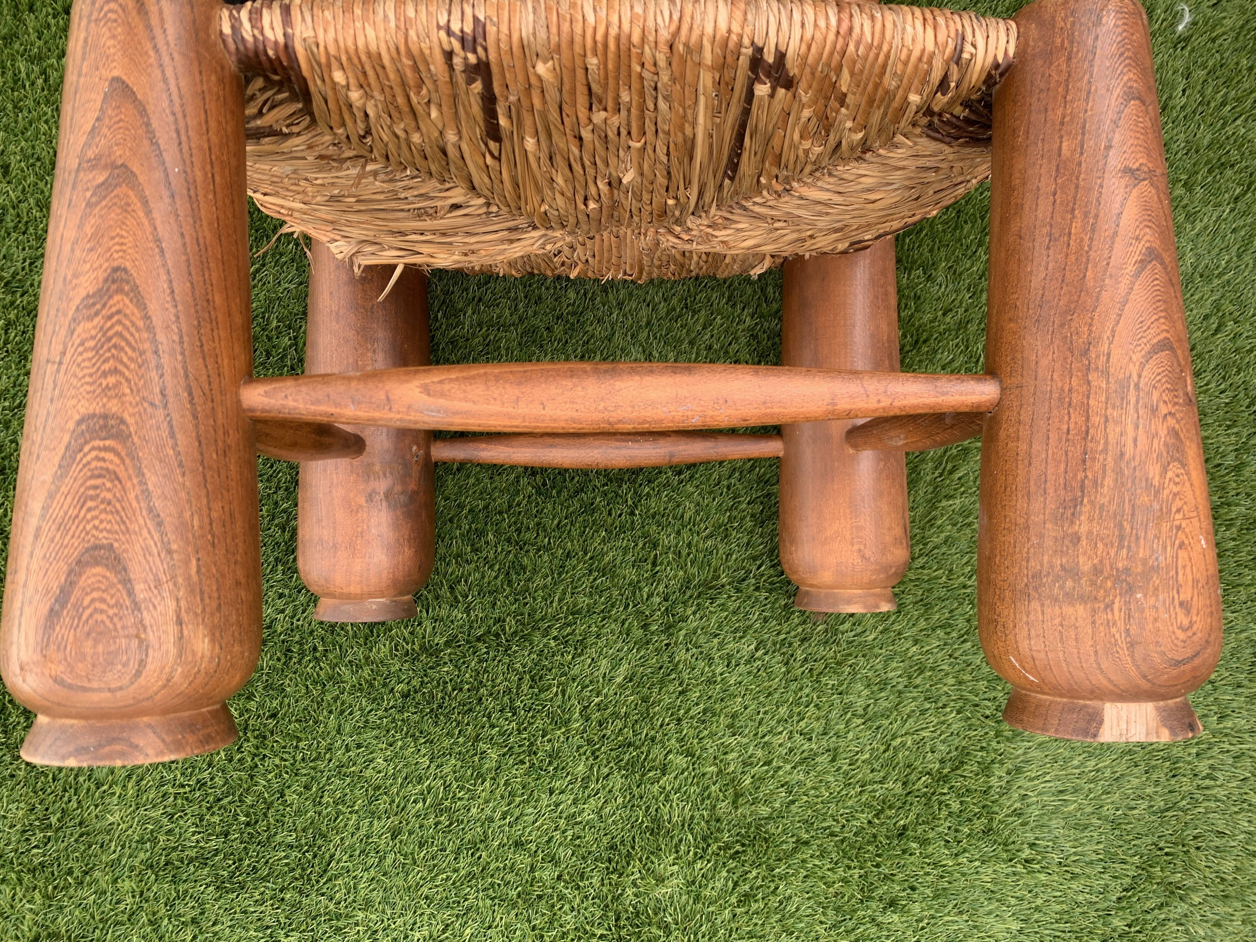 Pair of antique low fire chairs made of wood and straw