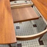 Table ronde en bois avec rallonges intégrées