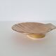 Shell-shaped brass catchall.