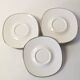 Set of 8 Georges Boyer Limoges porcelain saucers