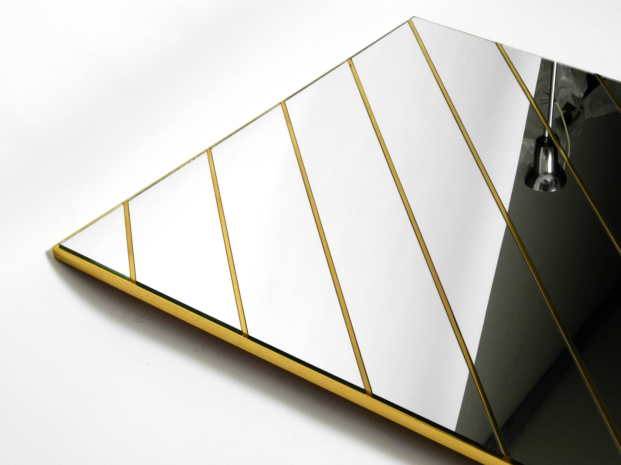 Large, exceptional 1970s brass wall mirror with diagonal mirror strips