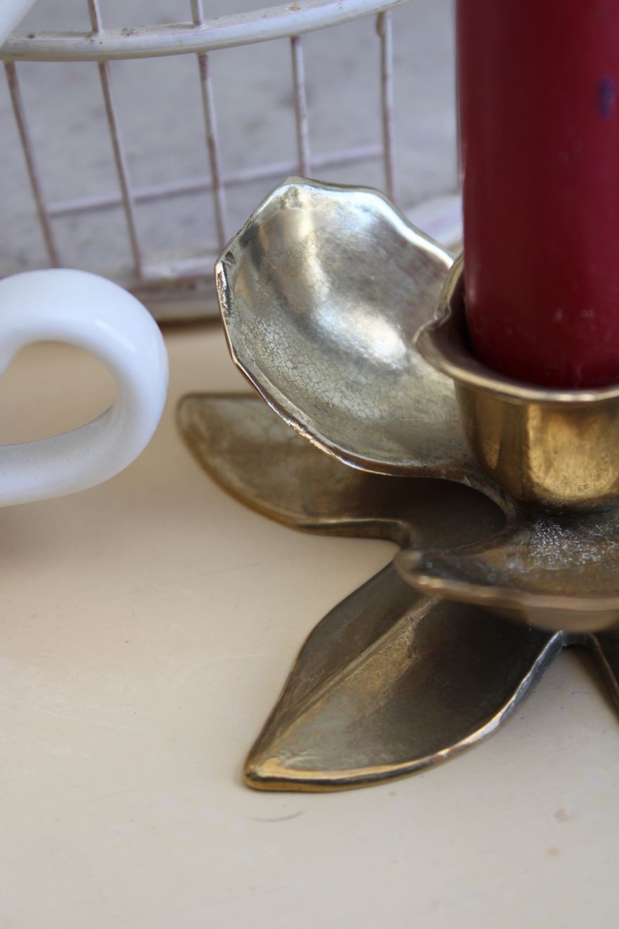 Golden brass candle holder