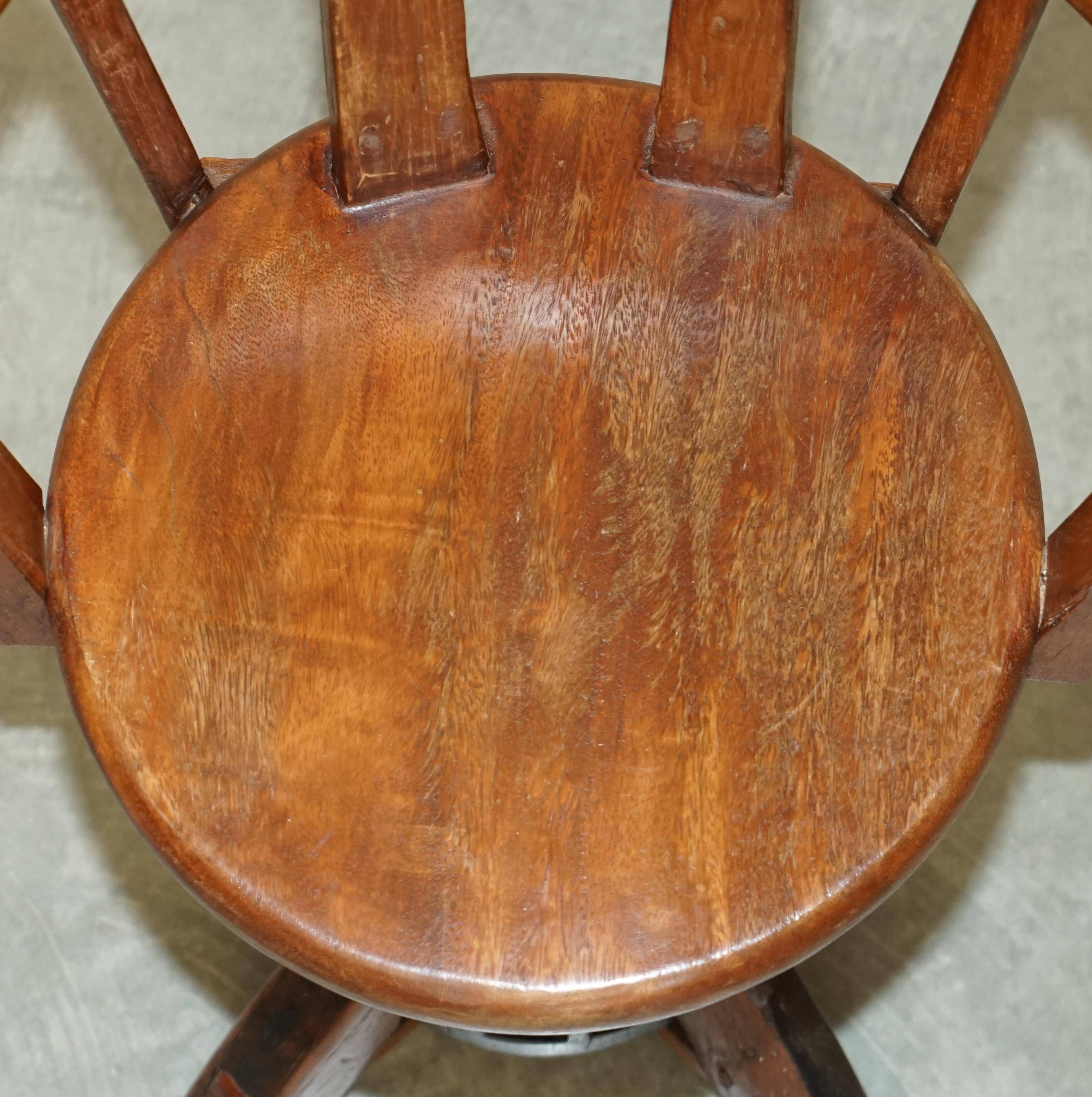 Antique captain's swivel chair on a draft horse wheel from around 1760.
