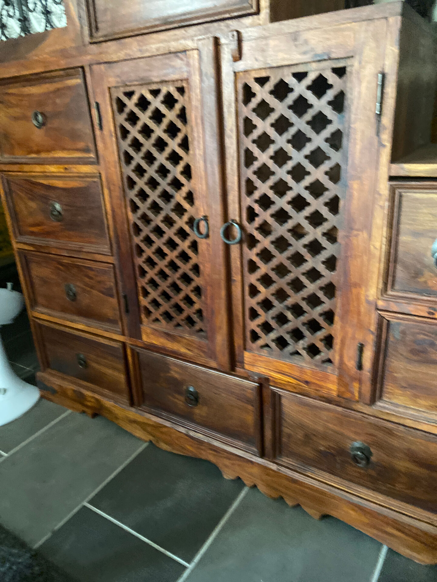 Indonesian staircase furniture in rosewood and wrought iron.