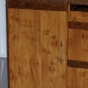 Walnut Burr buffet with drawers and wheels, part of a set.