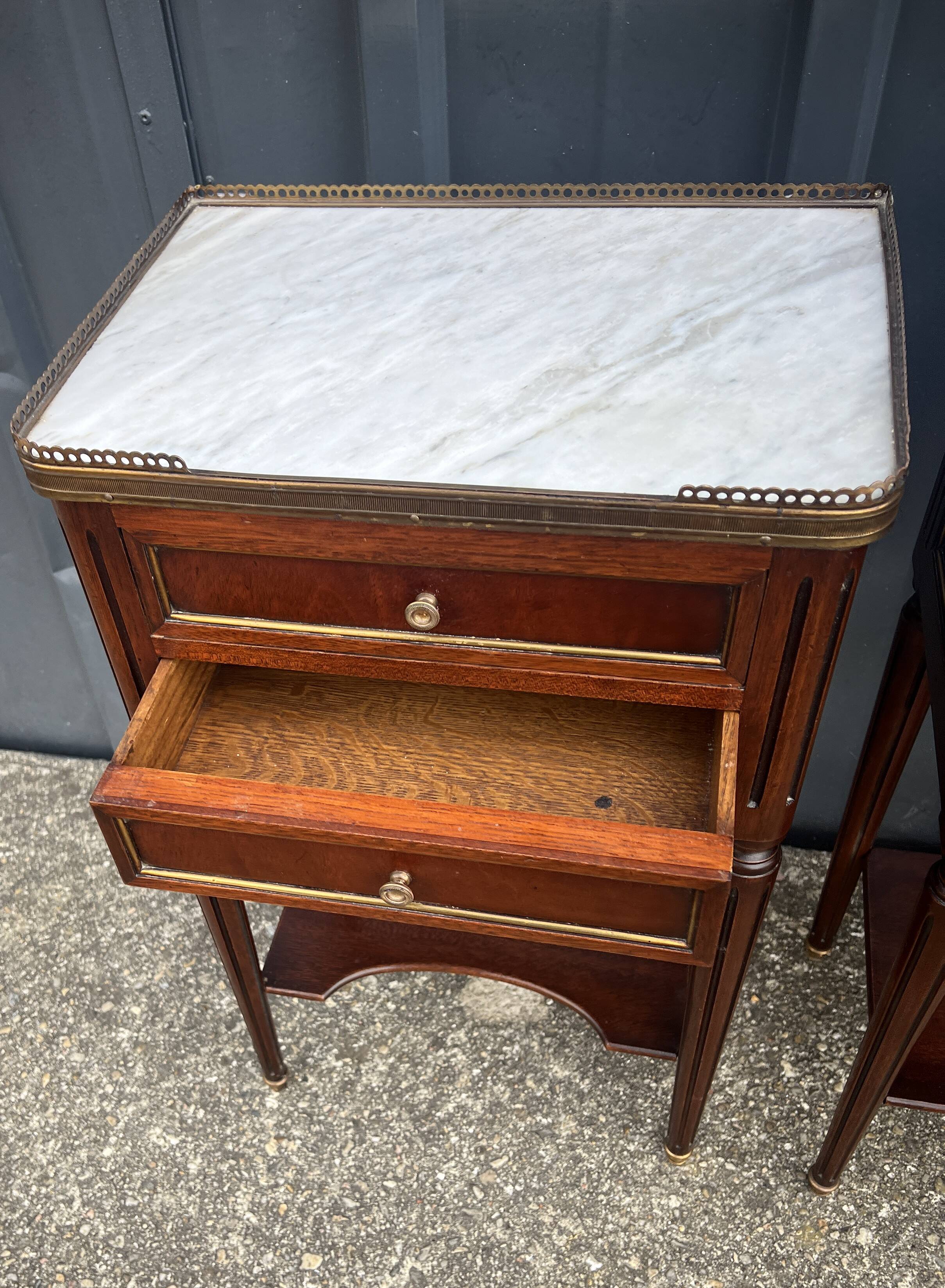 Pair of mahogany bedside tables, marble top, Louis XVI style