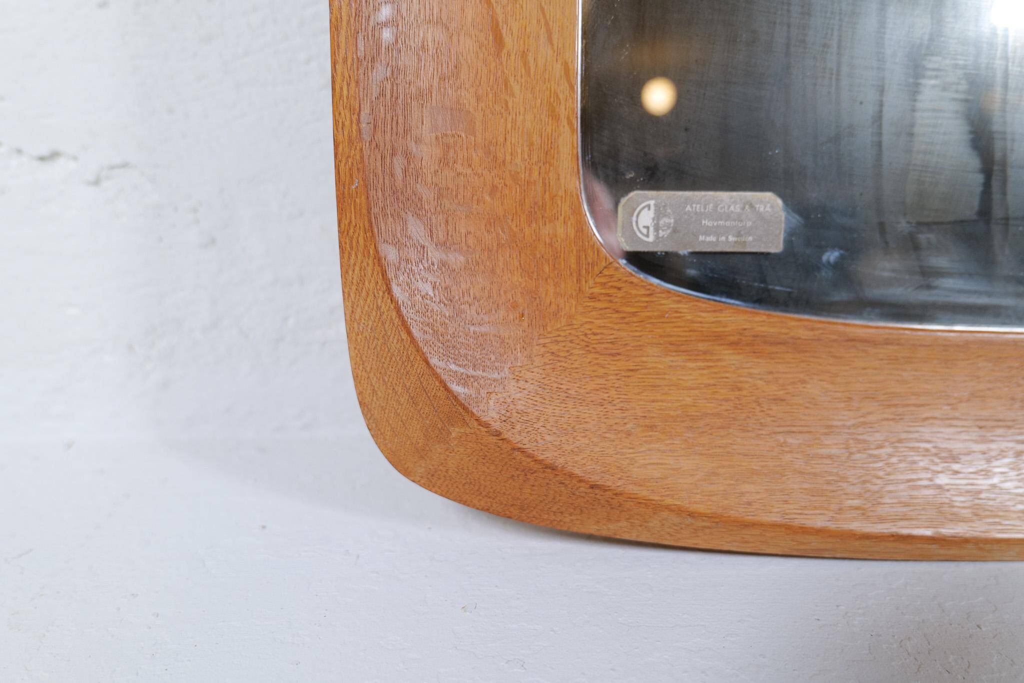 Mid-century modern sculptural wall mirror, oak, crystal glass, Glas & Trä, 1960s