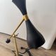 Eichholtz Cordero desk lamp in brass, black metal and marble.