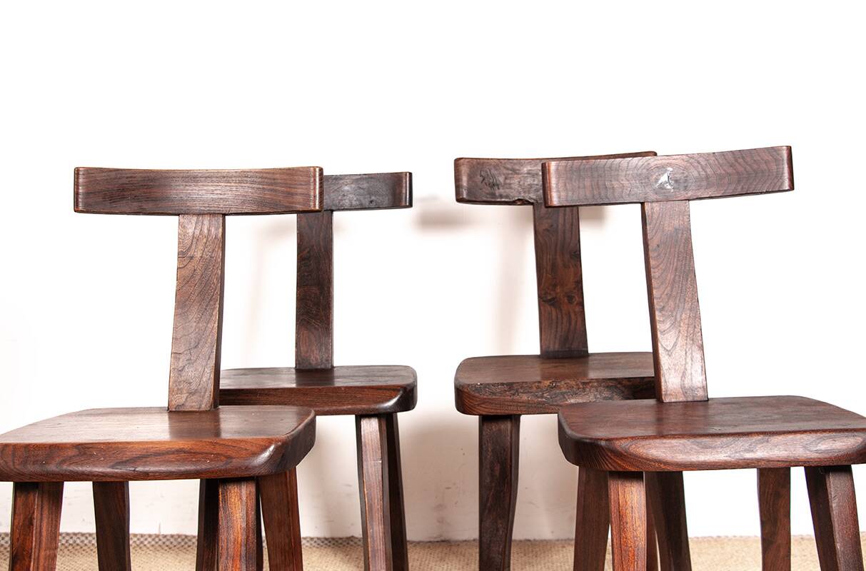 Set of 4 Scandinavian chairs in solid Elm, model T in the style of Olavi Hannin.