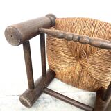 Brutalist chair in wood and straw