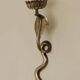 Pair of Neo-Egyptian Style Engraved Brass Wall Sconces Featuring Cobras