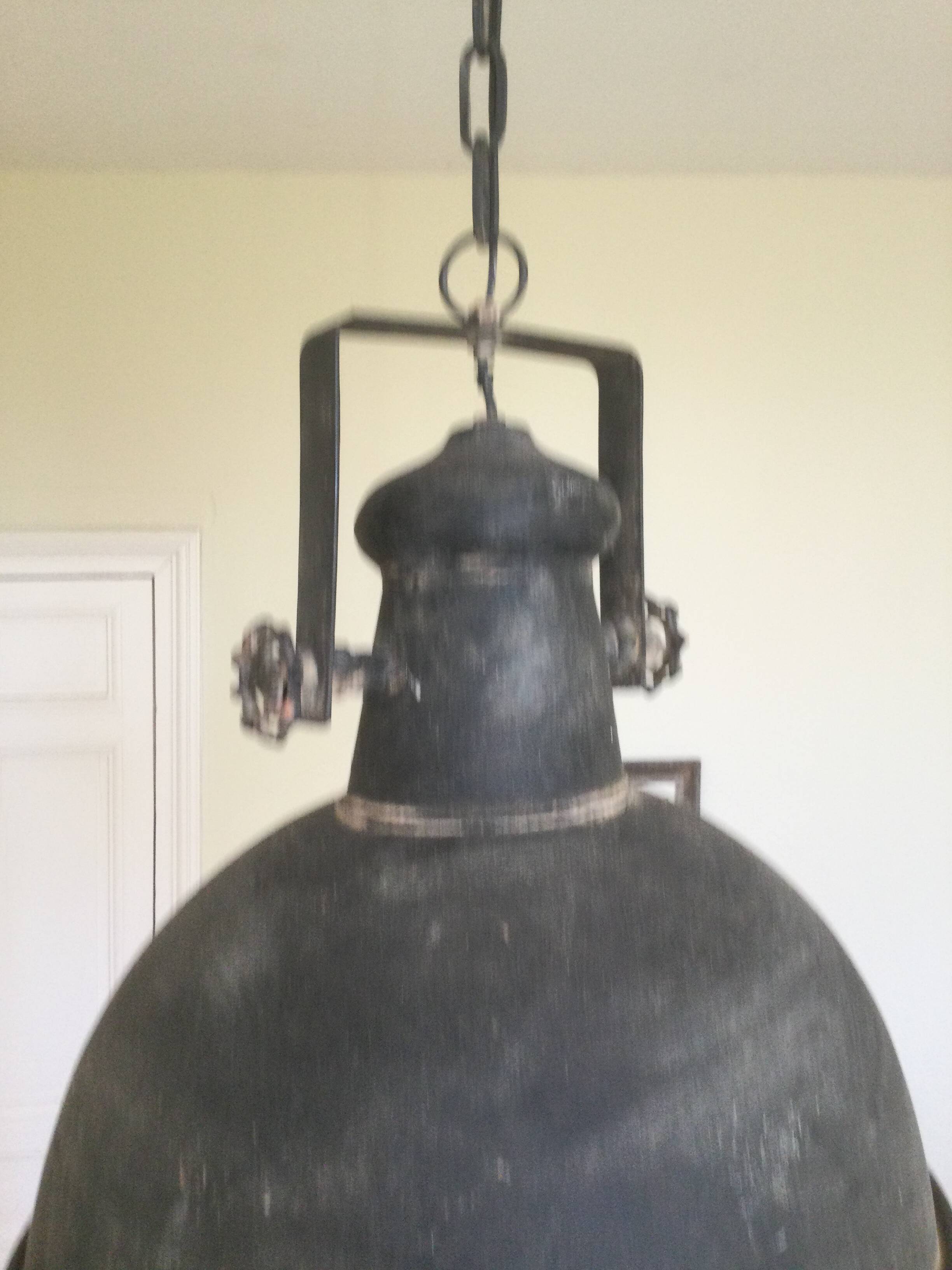 Large round sheet metal pendant light