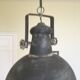 Large round sheet metal pendant light