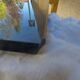 brass coffee table with 2 smoked glass tops 1970s/80s