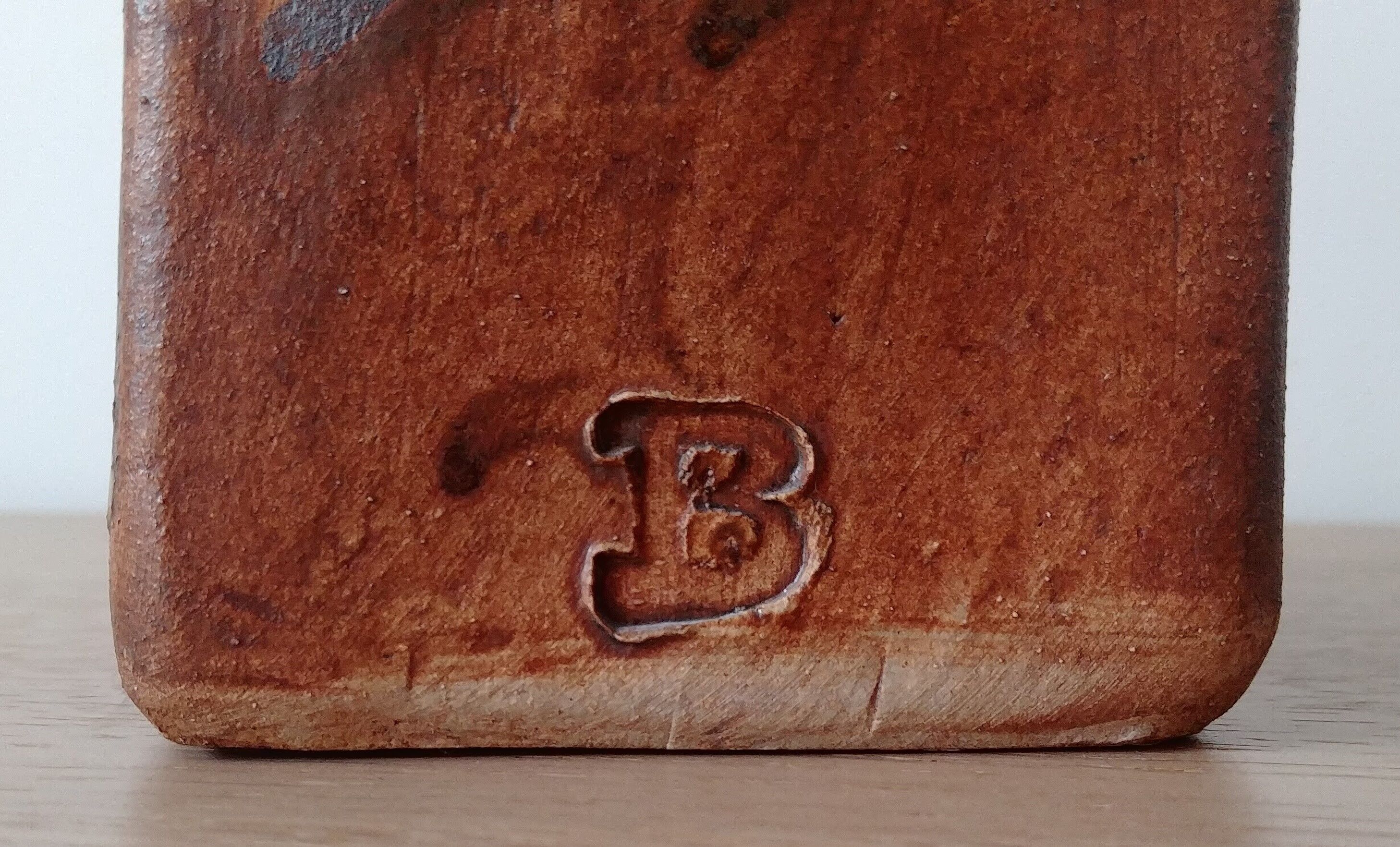 Signed sandstone vase