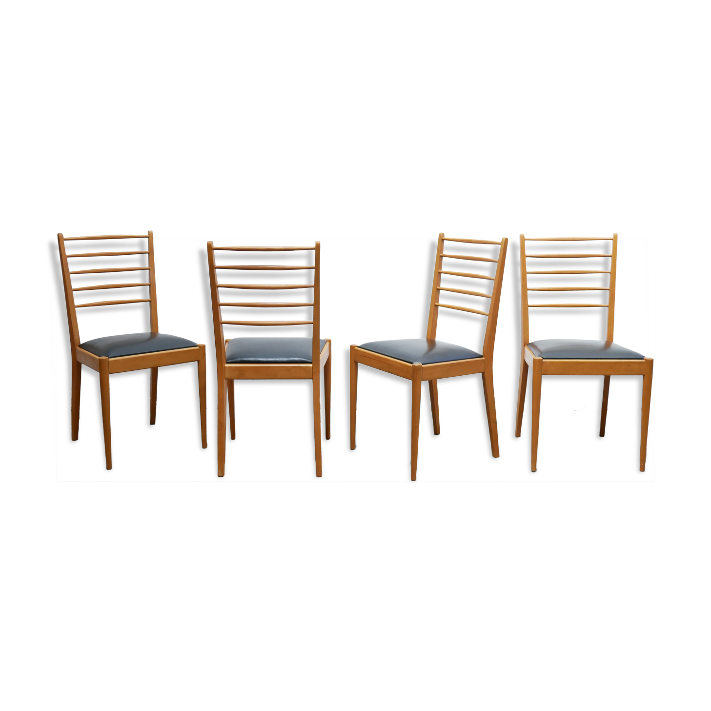 Series of 4 vintage chairs in wood and skaï