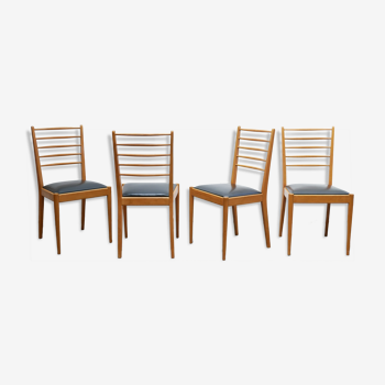 Série de 4 chaises vintage en bois et skaï