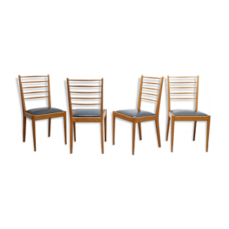 Series of 4 vintage chairs in wood and skaï
