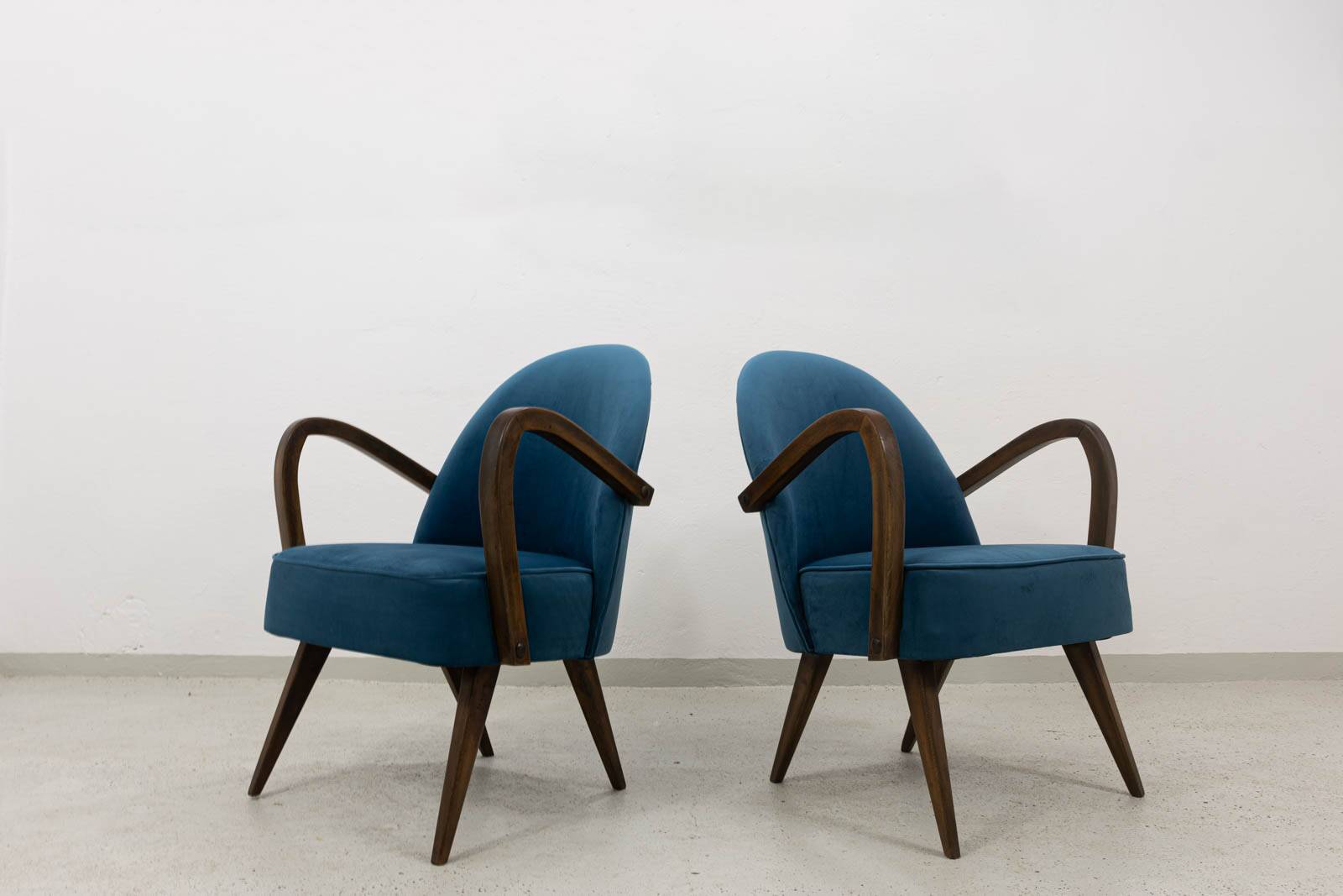 Pair of mid-century cocktail chairs, Poland, 1950s
