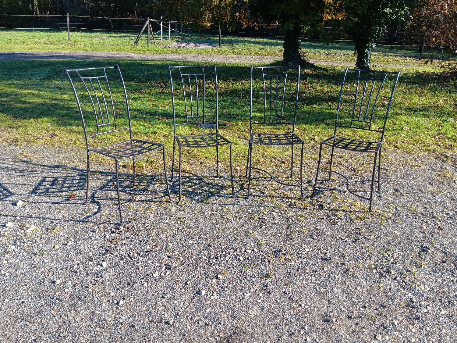 Wrought iron chairs with cushions