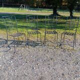 Wrought iron chairs with cushions