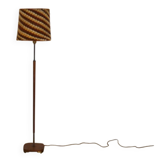 Scandinavian floor lamp in teak and brass from the 1960s.