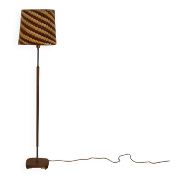 Scandinavian floor lamp in teak and brass from the 1960s.
