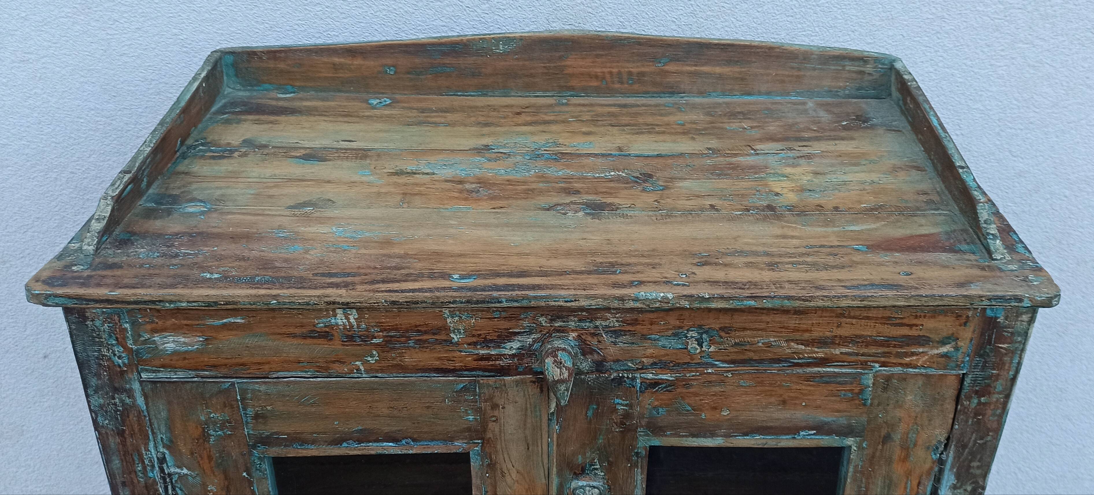 Old wooden cabinet with 4 doors