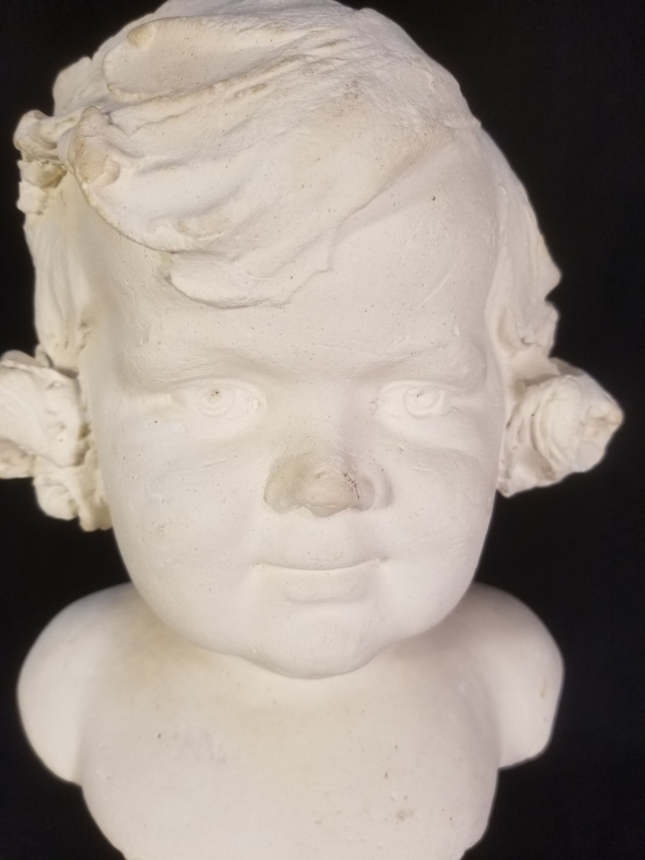 Old plaster bust - The gracious child