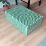 Green mosaic tile table and cream joint