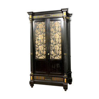 Napoleon III period library in blackened wood and gilding around 1850