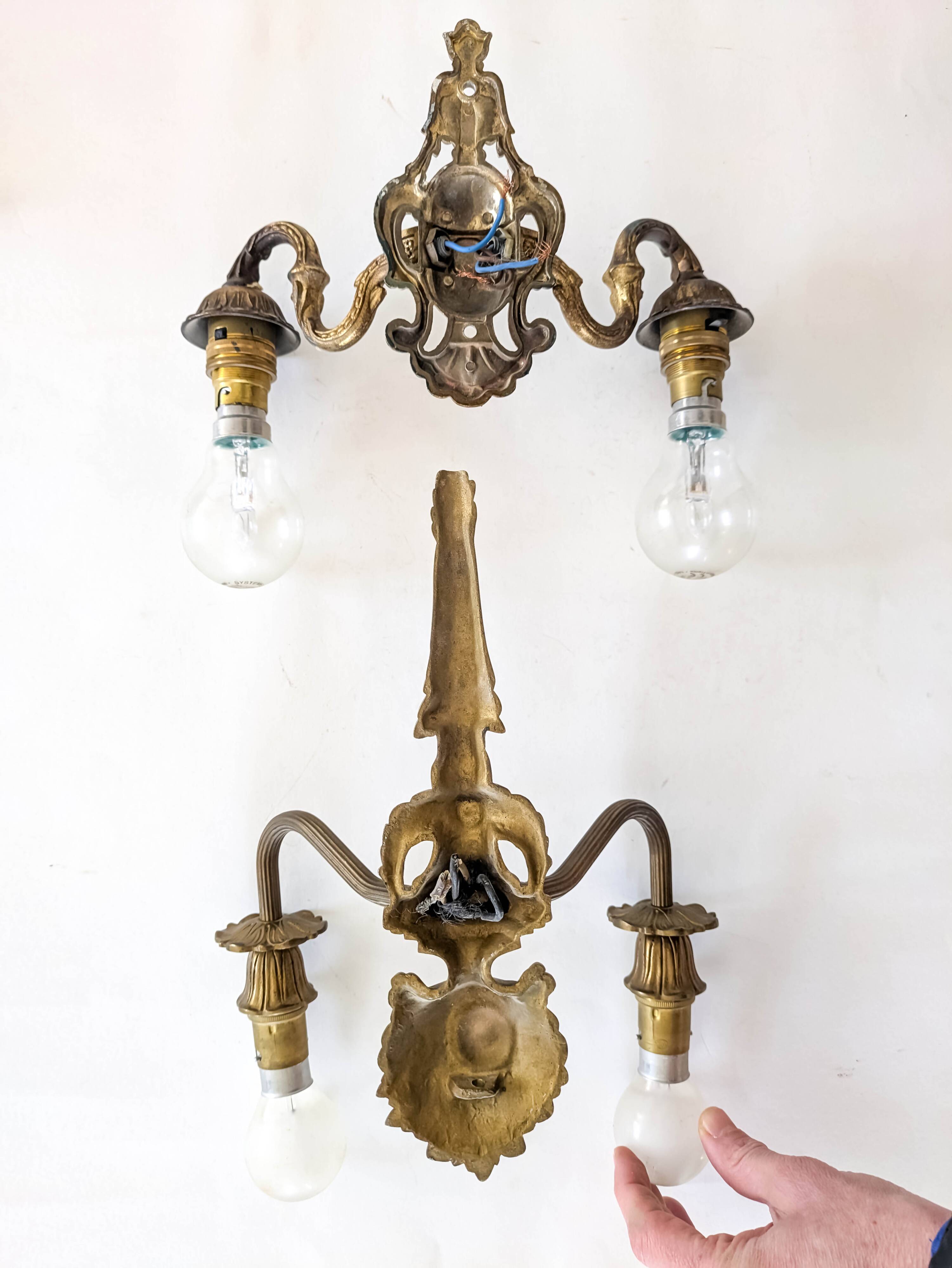 Two antique wall lights