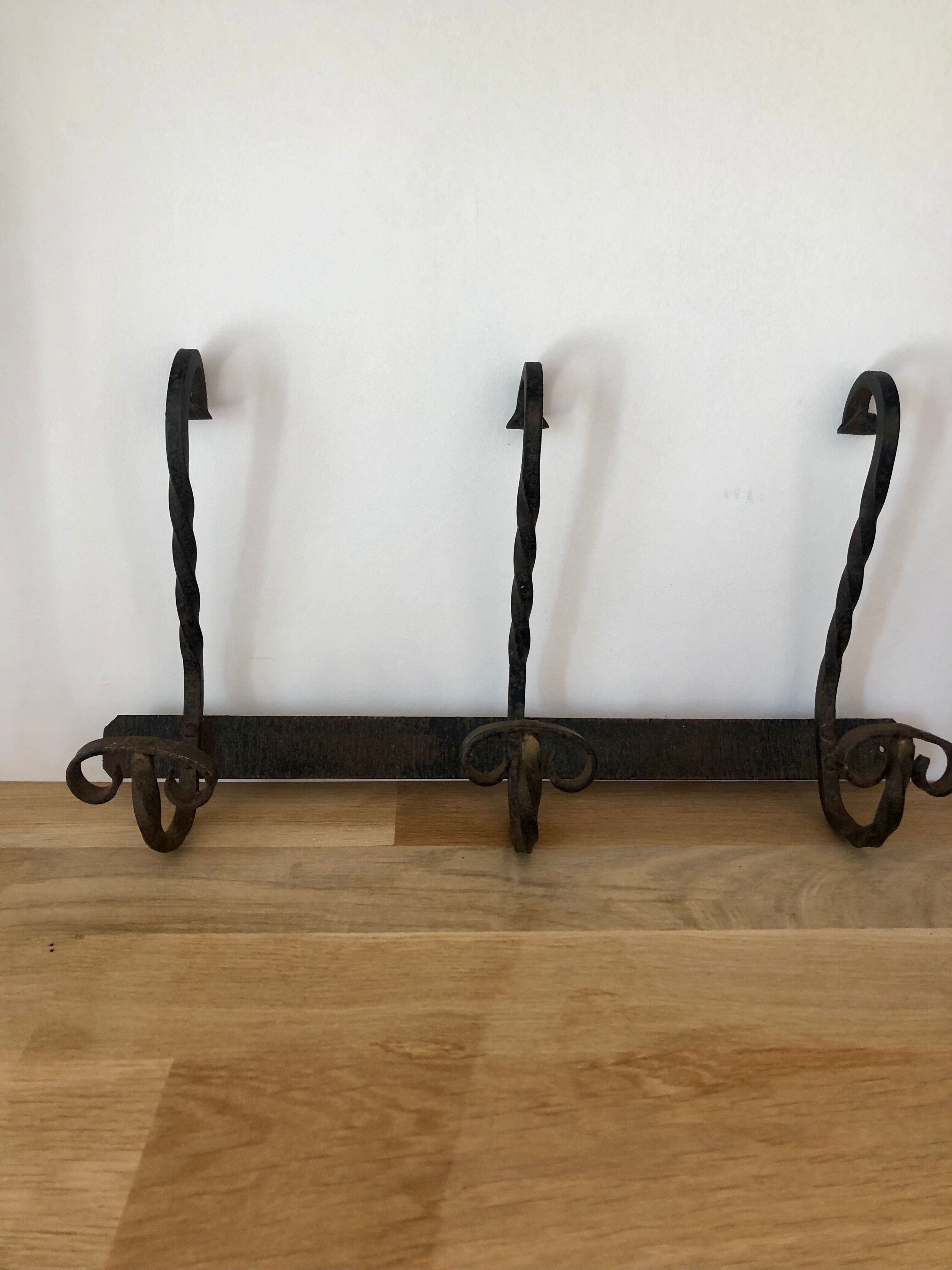 Old wrought iron coat hook/coat rack