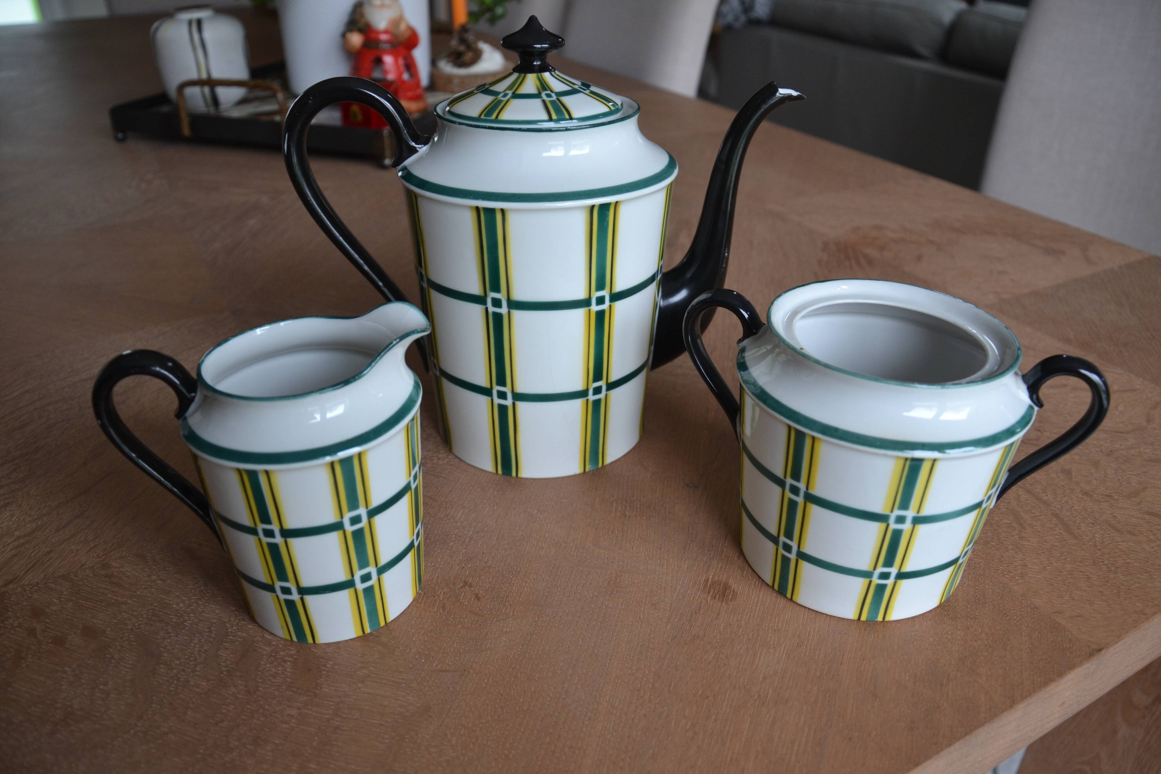 Limoges porcelain teapot, sugar bowl and milk jug
