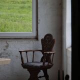 Scandinavian armchair in solid oak with cushion, folk art, early 19th century.