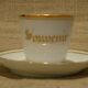 Old white and gold porcelain mocha cup marked souvenir