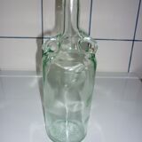Bouteille ancienne en verre moulée transparente
