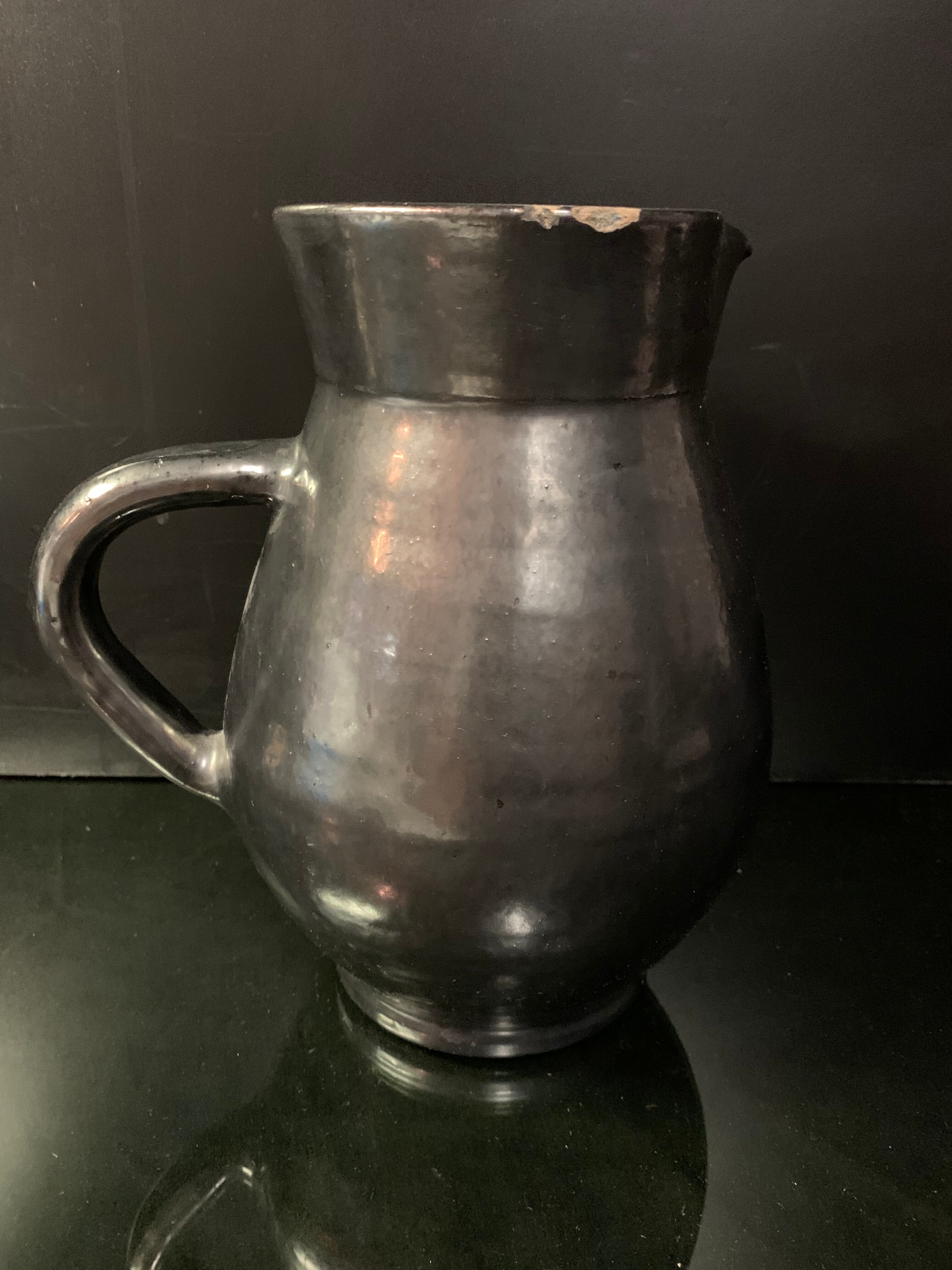 Black ceramic pitcher carafe design 1950