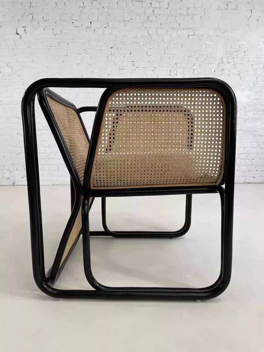 Cubic armchair in black rattan and canework