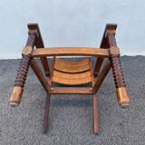 Vintage armchair in straw and brutalist wood